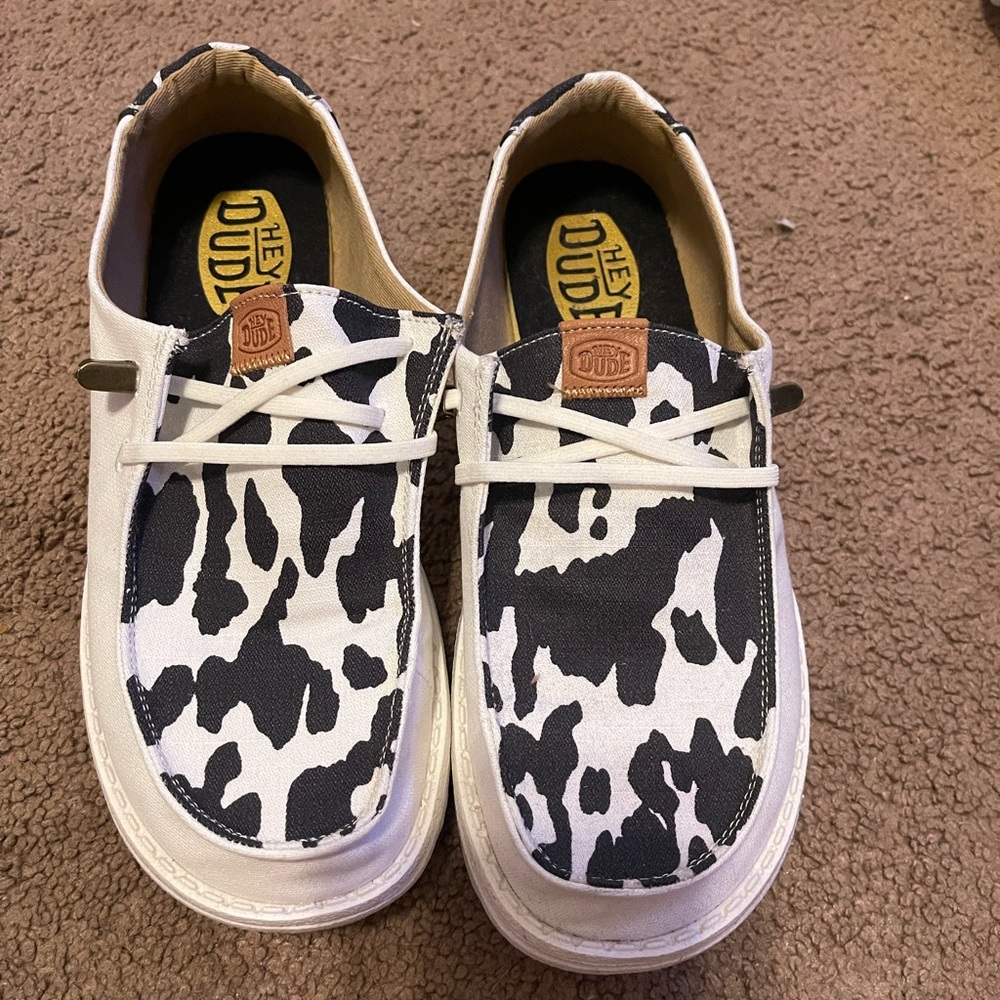 Hey Dude Black and White Cow Print Sneakers